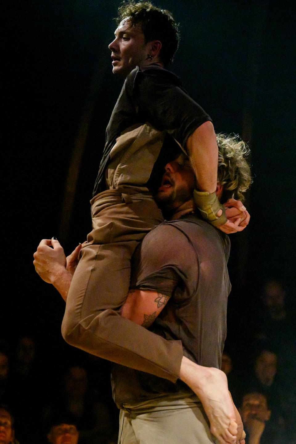 two acrobats on stage